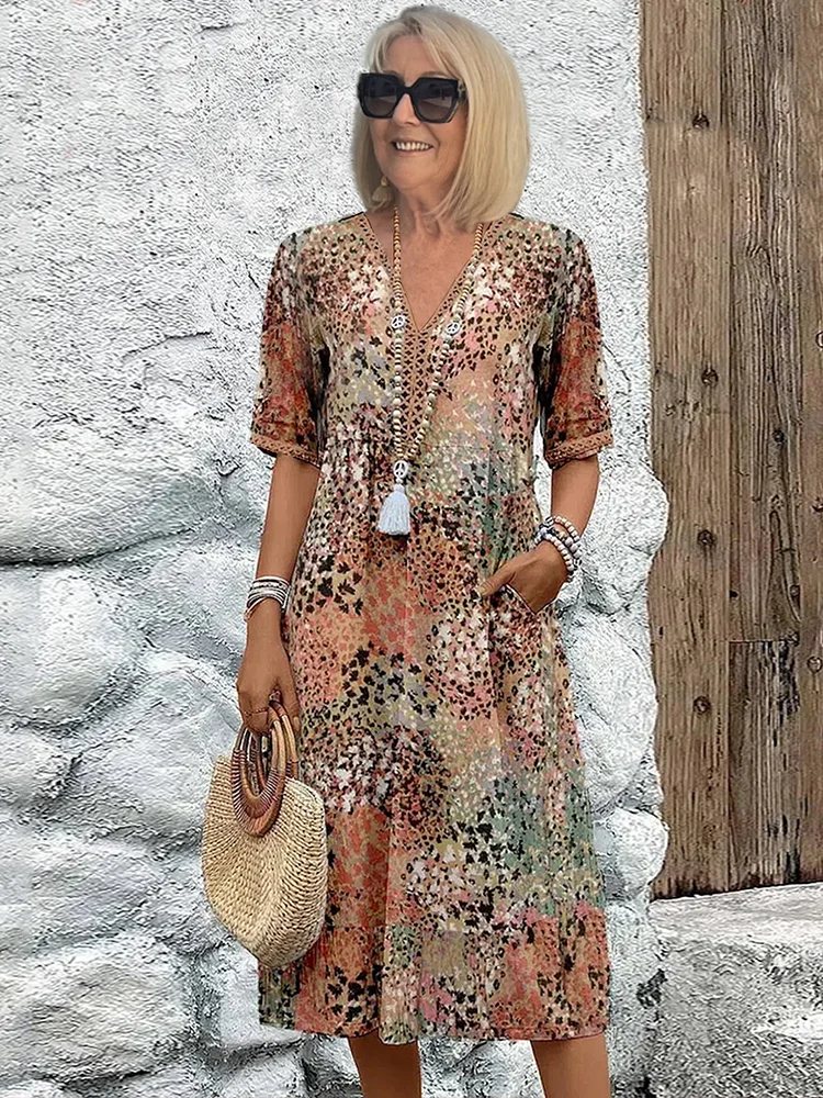 Avaline | Speelse Gedrukte Midi Dress