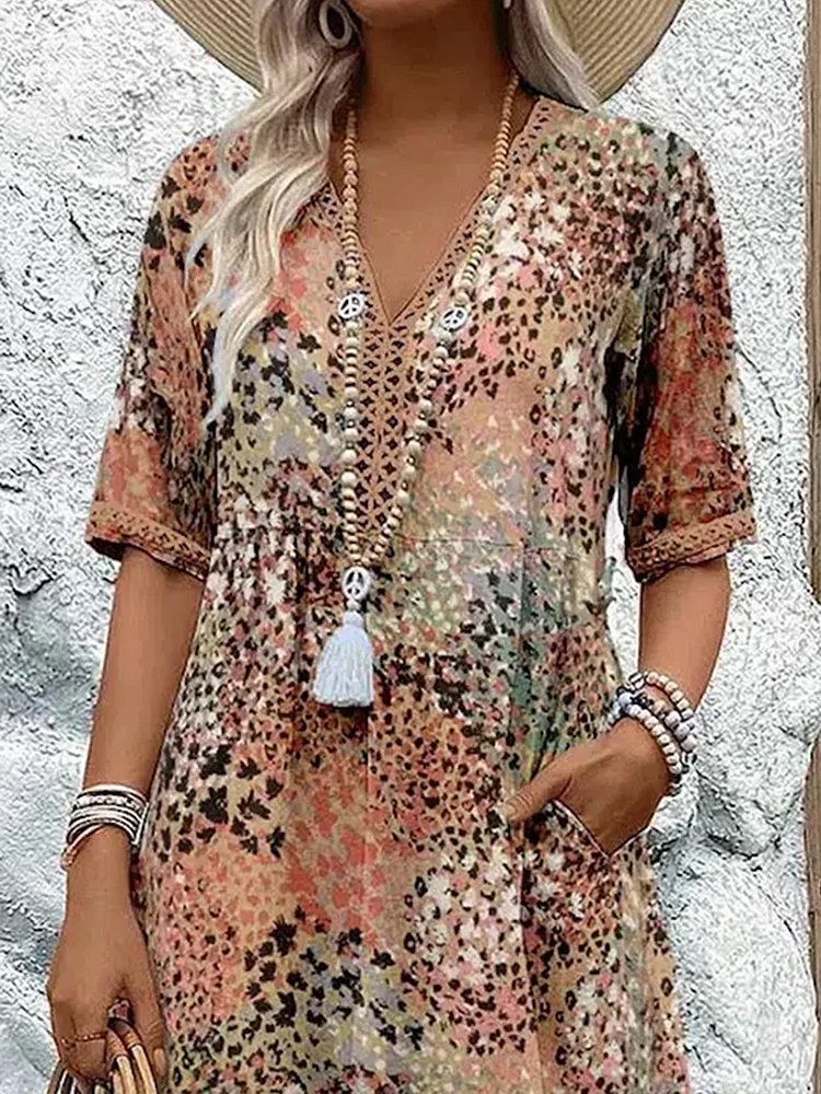 Avaline | Speelse Gedrukte Midi Dress