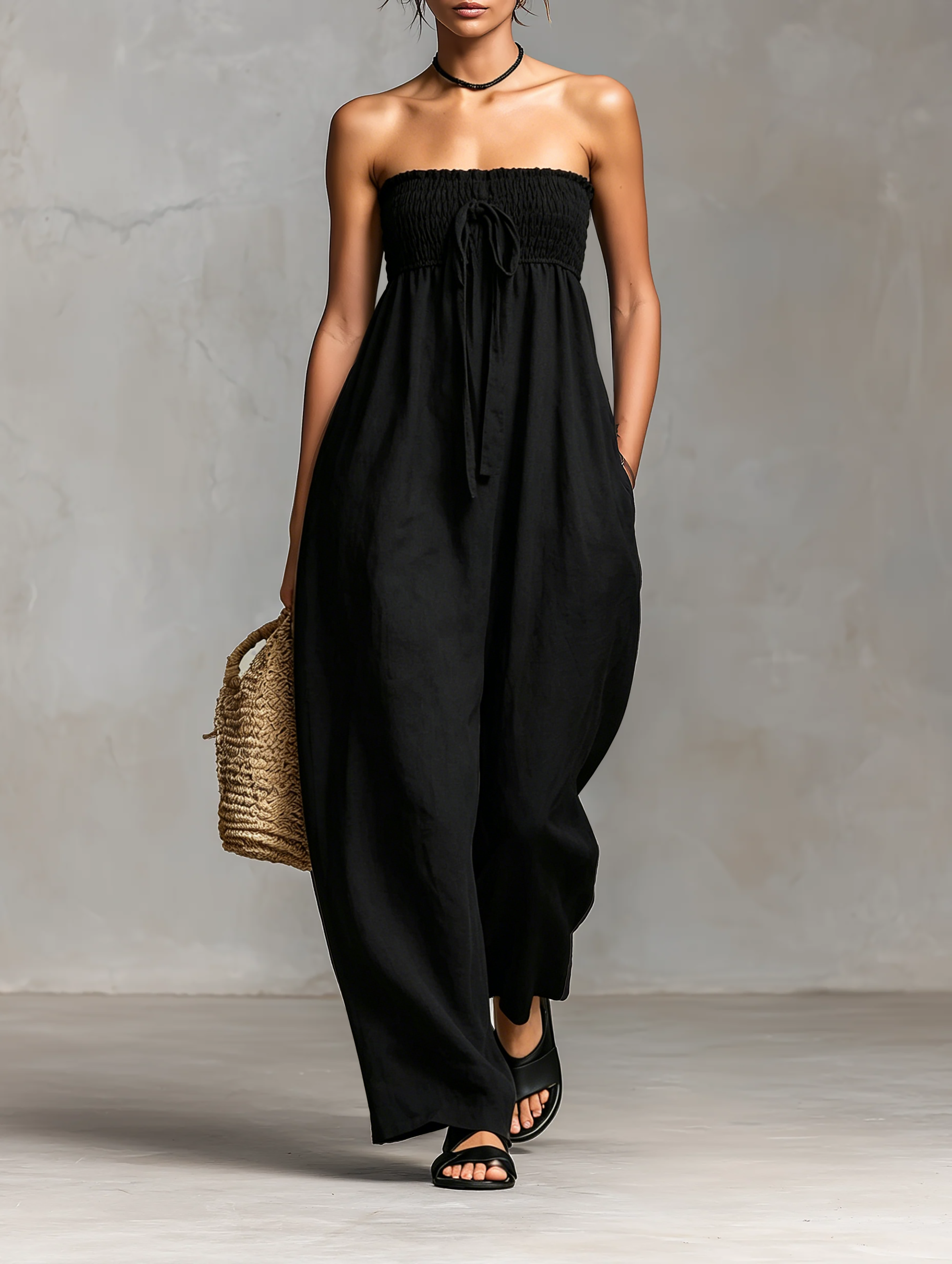 Fleur | Mouwloze jumpsuit met strikceintuur