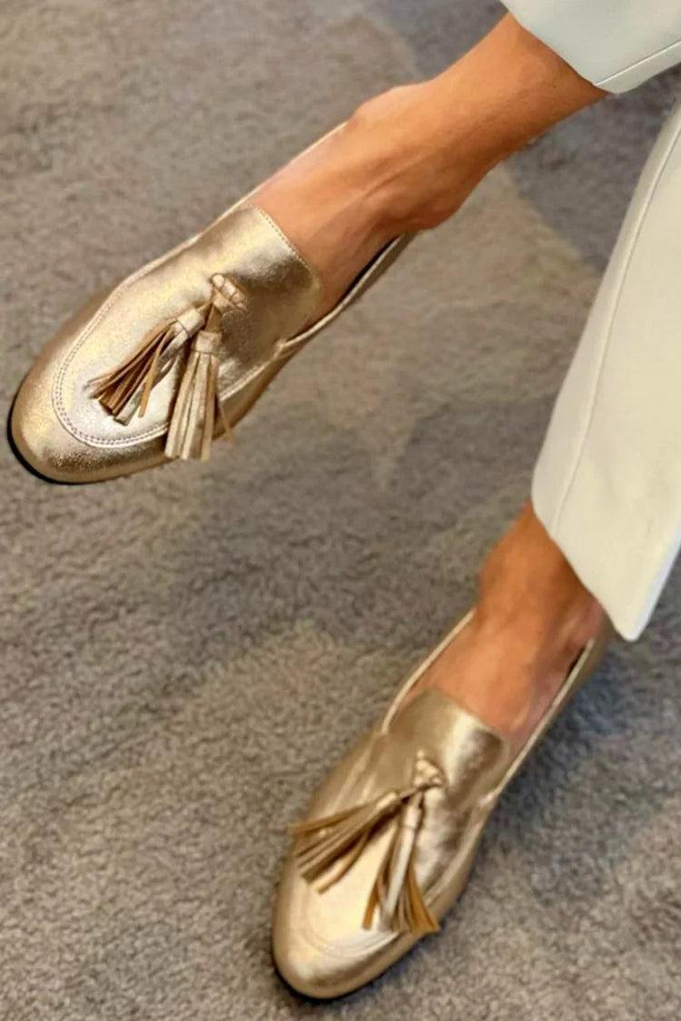 Beatrice | Gouden instappers met metallic effect en franjes