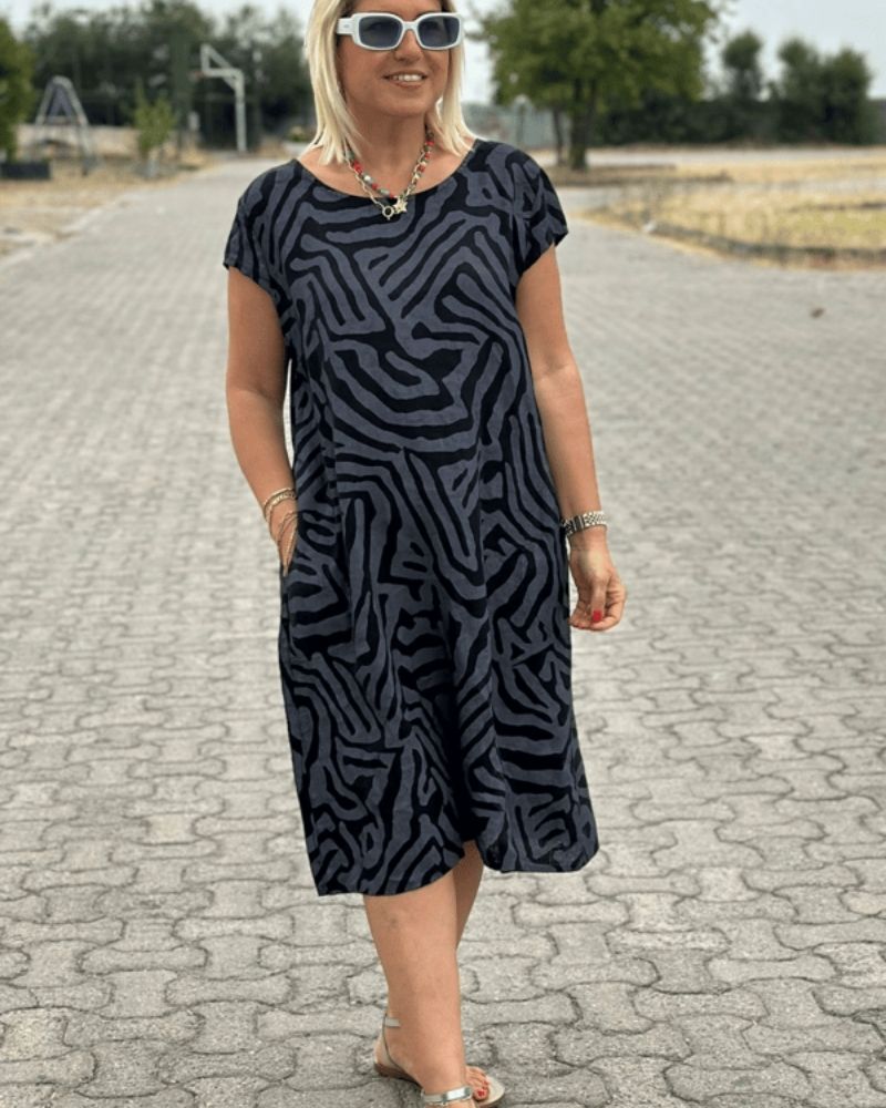 Melia | Zomerjurk met ronde hals en prachtige print