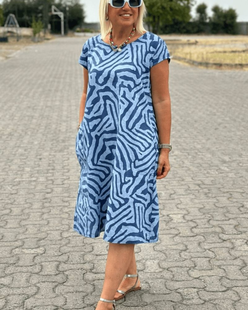 Melia | Zomerjurk met ronde hals en prachtige print