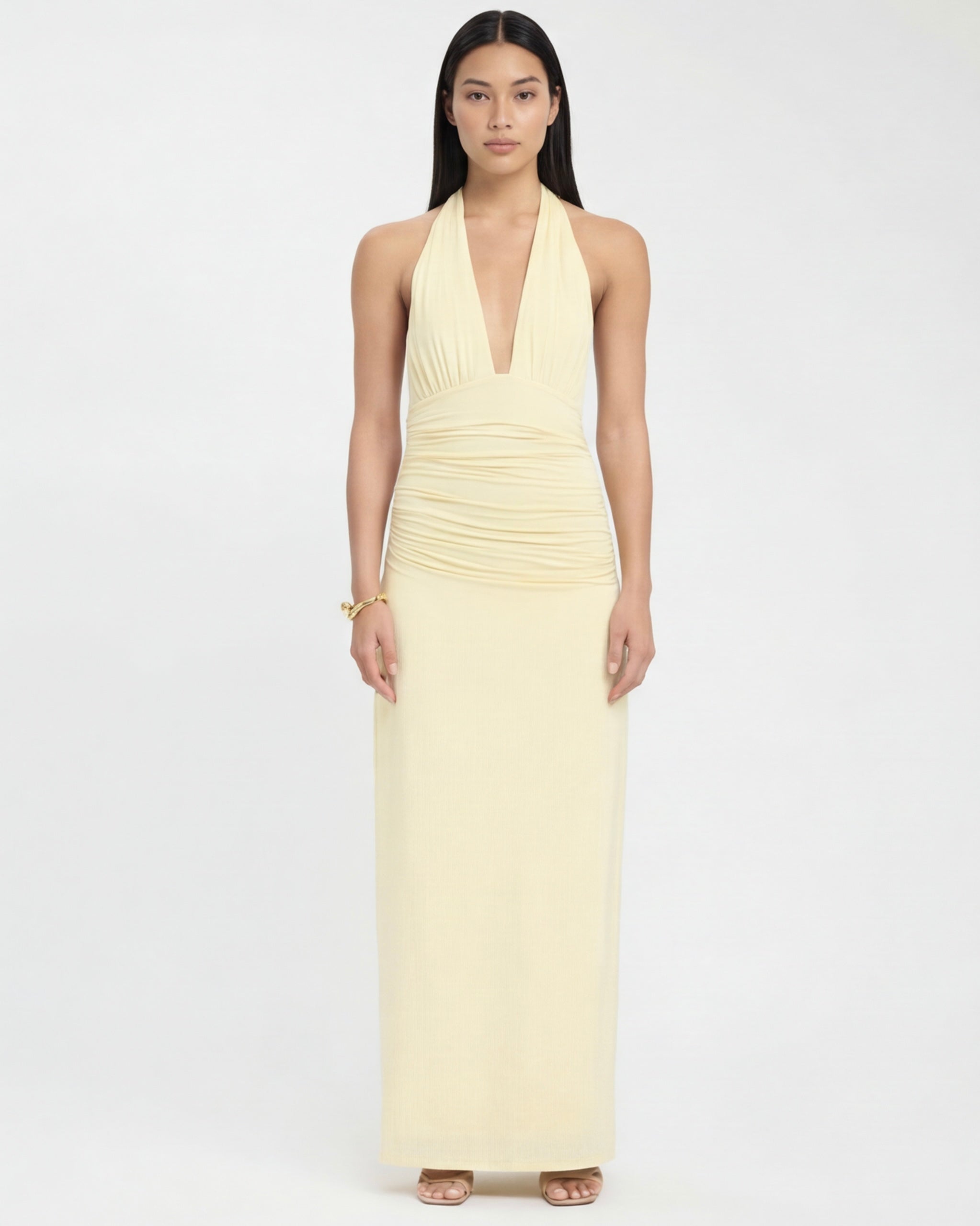 LANG JURK MET HALTER NECK EN OPEN RUG