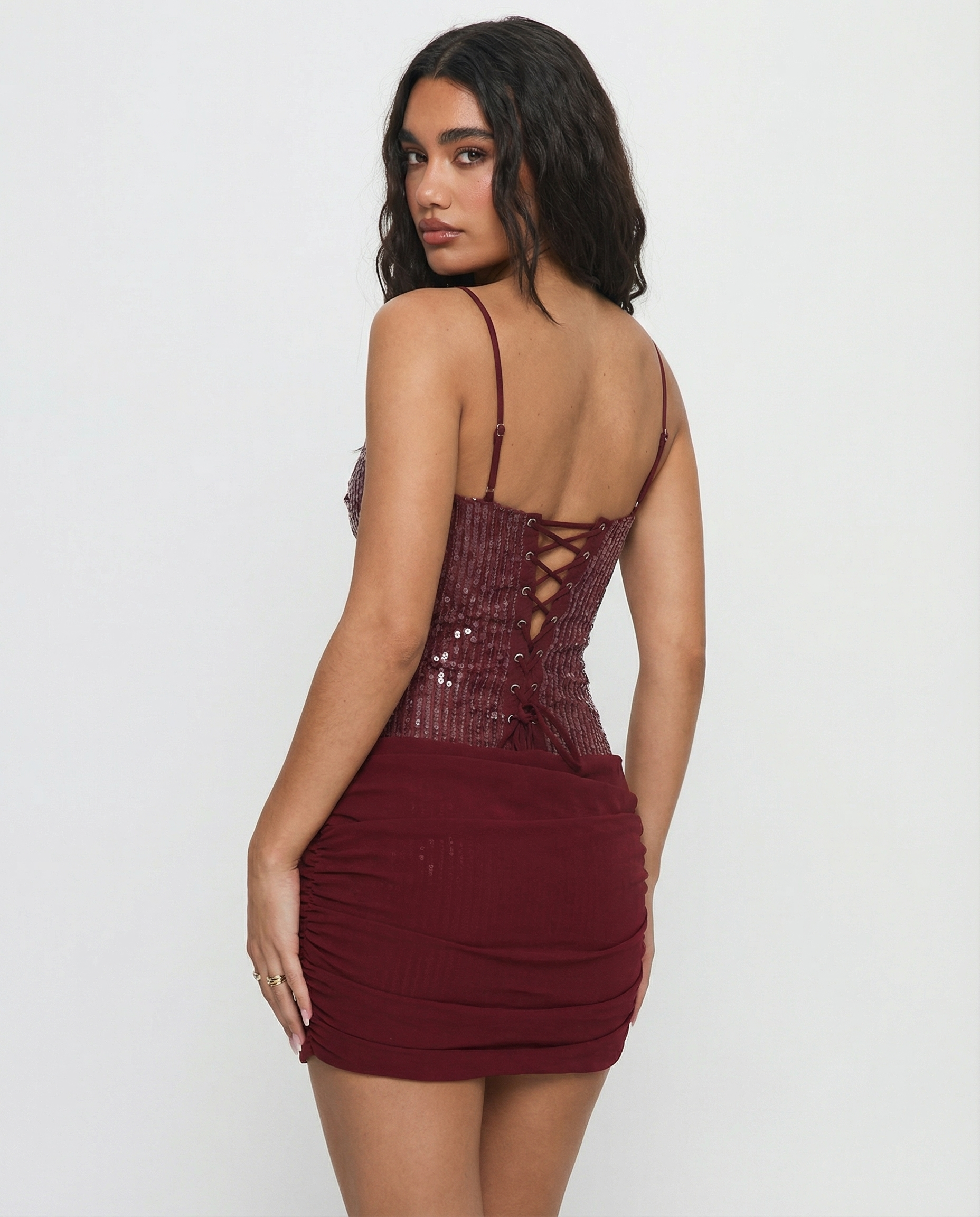 MINI JURK MET PAILLETTEN EN CORSET ACHTERKANT