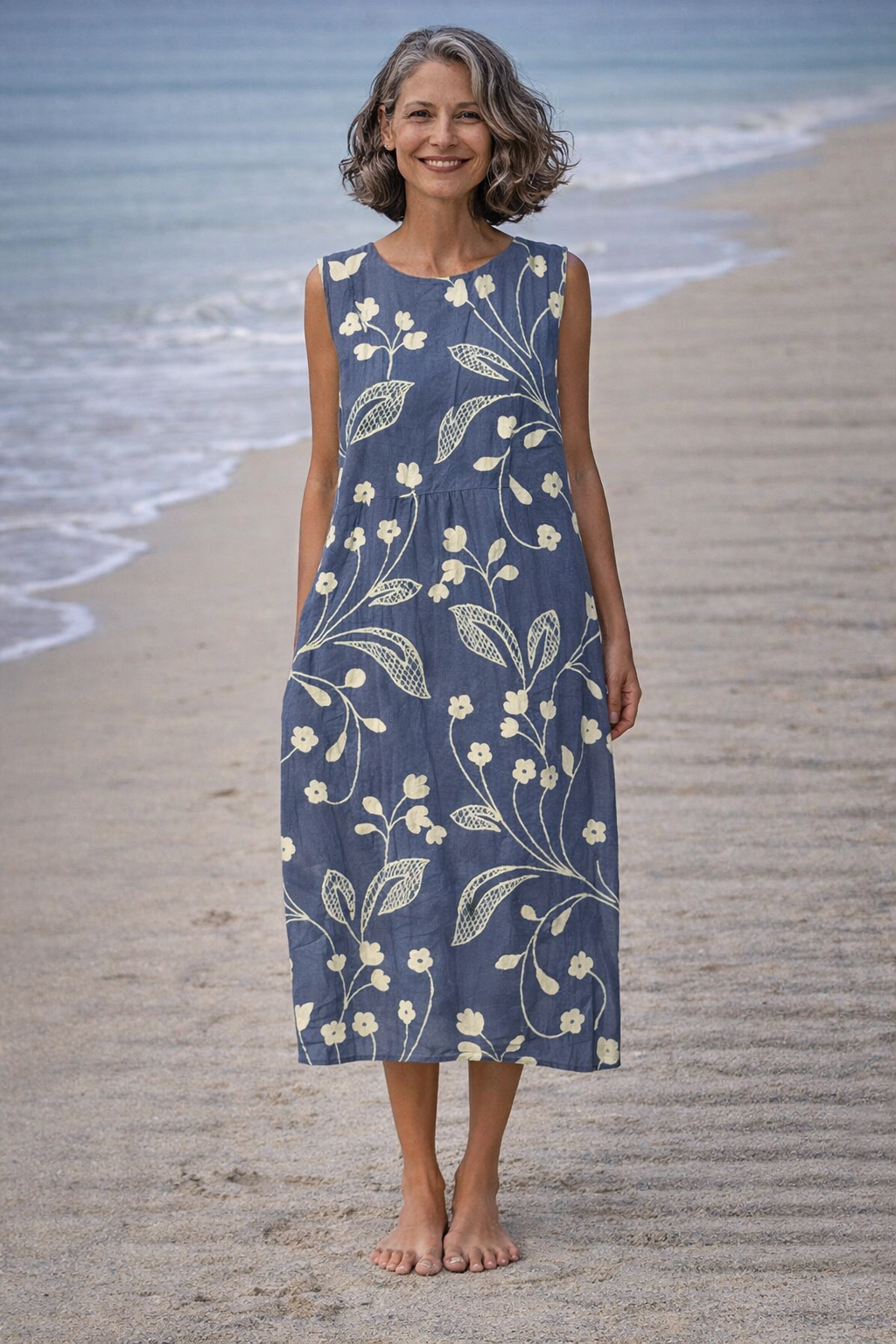 Estela | Mouwloze midi-jurk met vintage bloemen