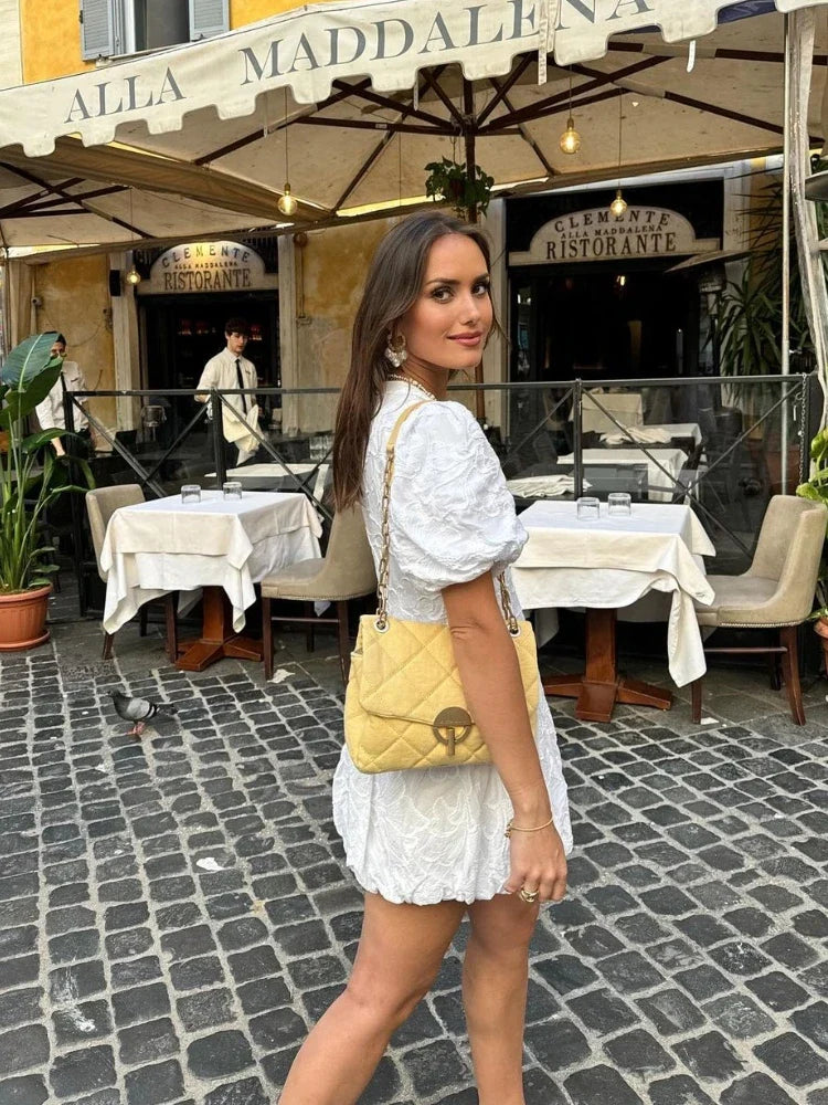 MINI JURK MET BORDUURSEL EN BOLLE MOUWEN