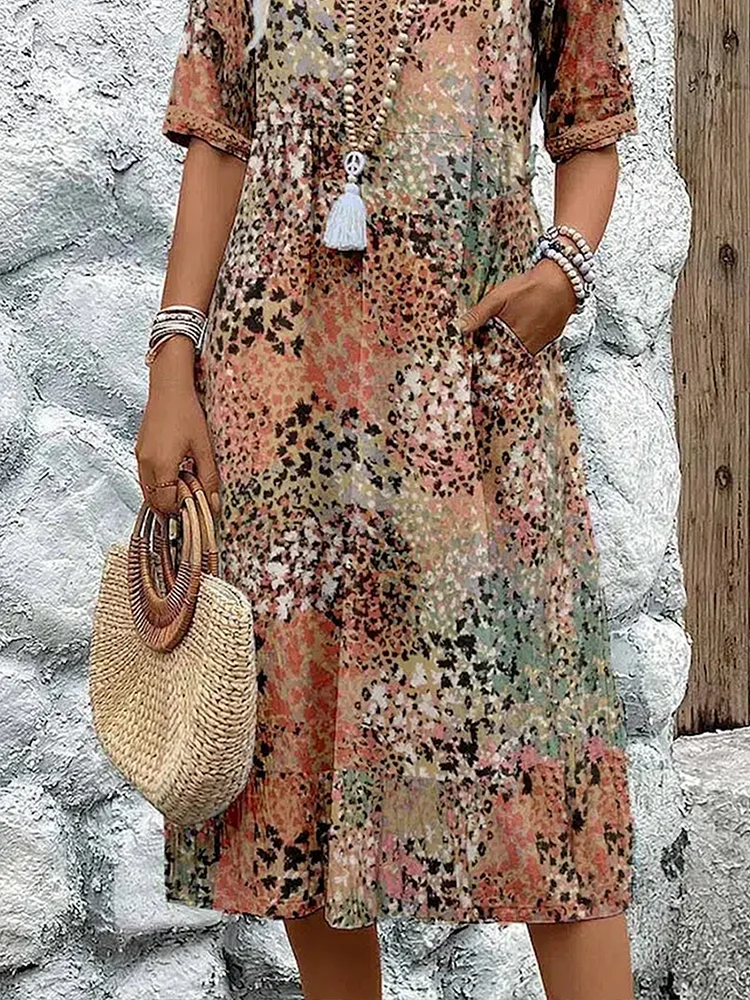 Avaline | Speelse Gedrukte Midi Dress