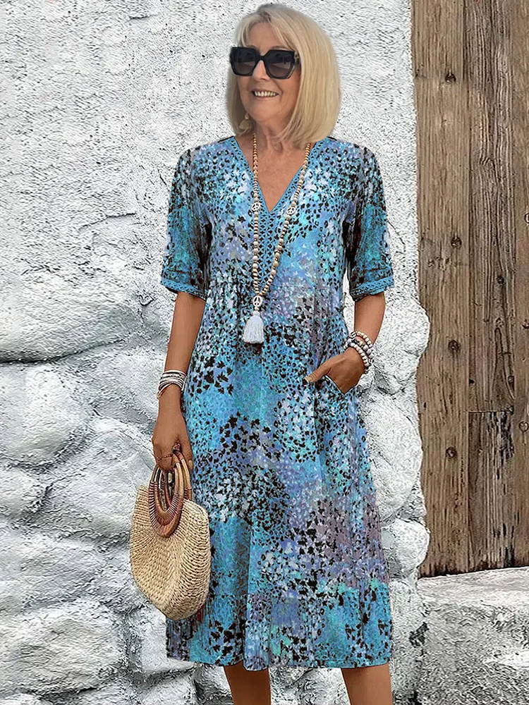 Avaline | Speelse Gedrukte Midi Dress